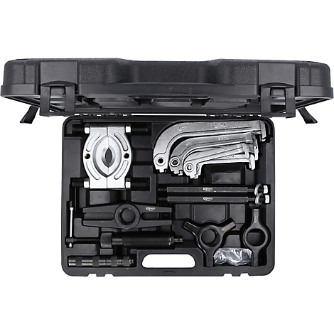 Werkzeugkasten mit offenem Deckel. Inhalt sind verschiedene Metallwerkzeuge.